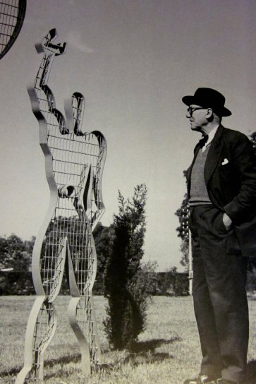 Photograph of Le Corbusier and Modulor